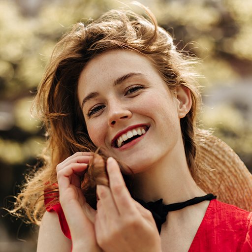 attractive-happy-woman-in-red-dress-smiling-outdoo-UW49SNL.jpg